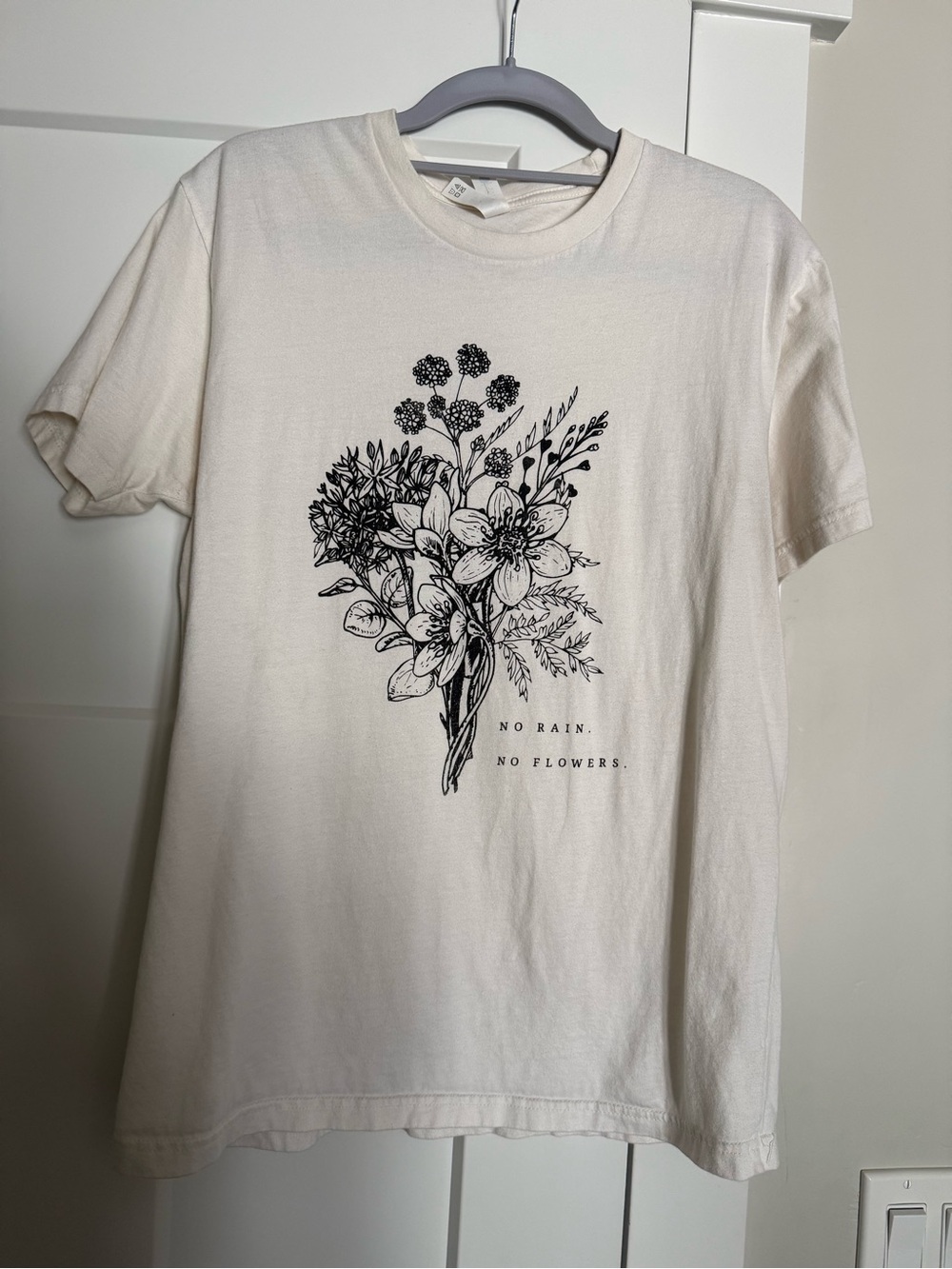 Cream Tee with Black Floral Graphic